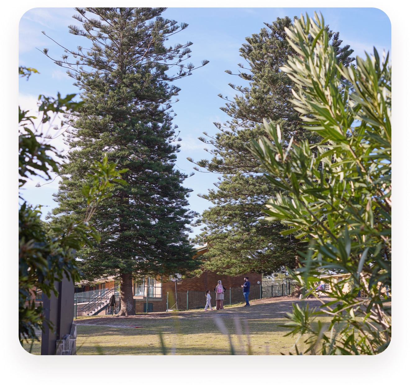 The heritage buildings of the primary campus at North Head Sanctuary, seen through the trees